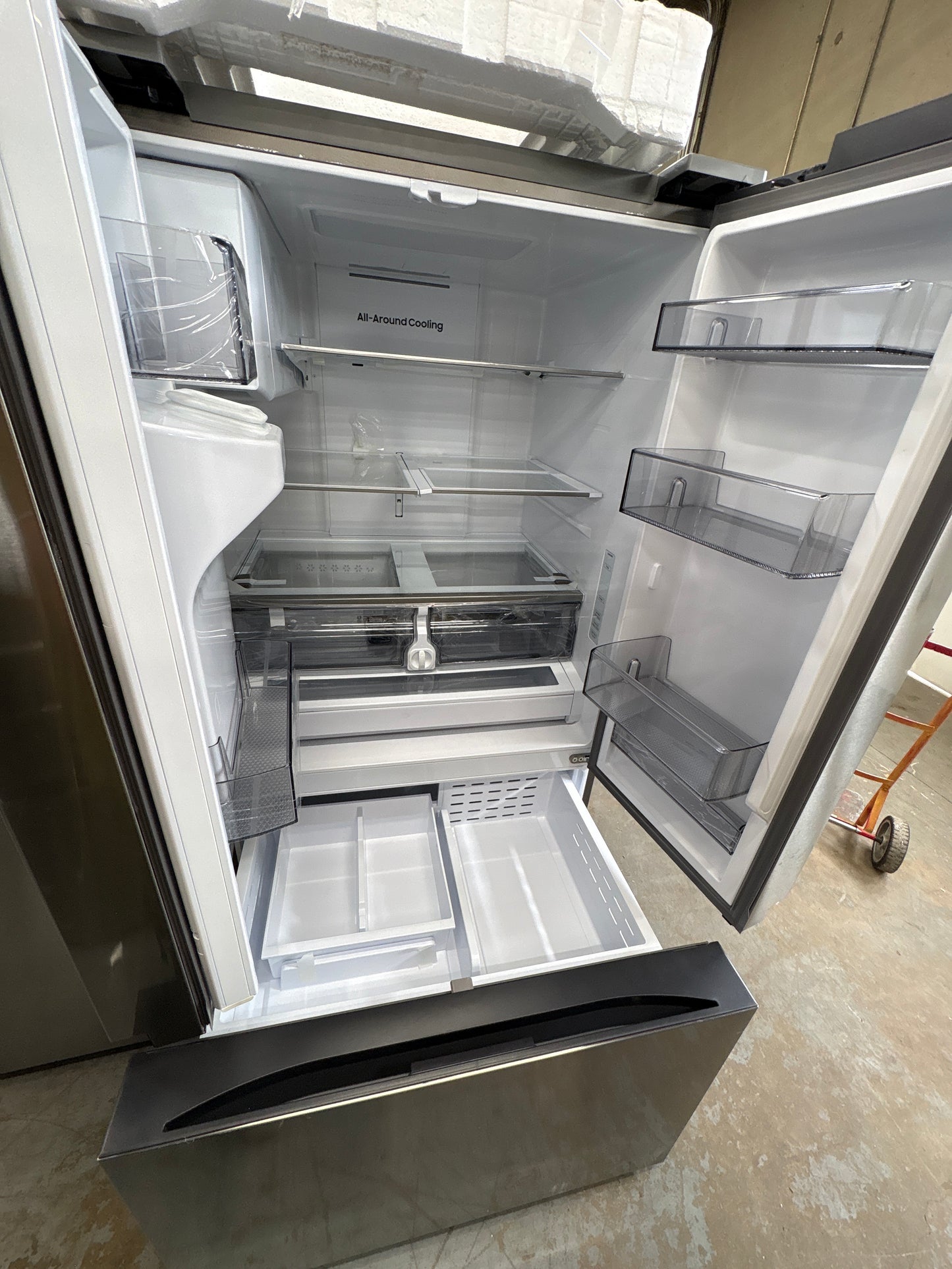 Samsung RF32CG5B10SR 31 cu. ft. Mega Capacity Standard Depth 3-Door French Door Refrigerator with External Water and Ice Dispenser  Dimensions: 35 3/4" W x 70" H x 29 7/16" D  Counter Depth: No  Color: Stainless Steel