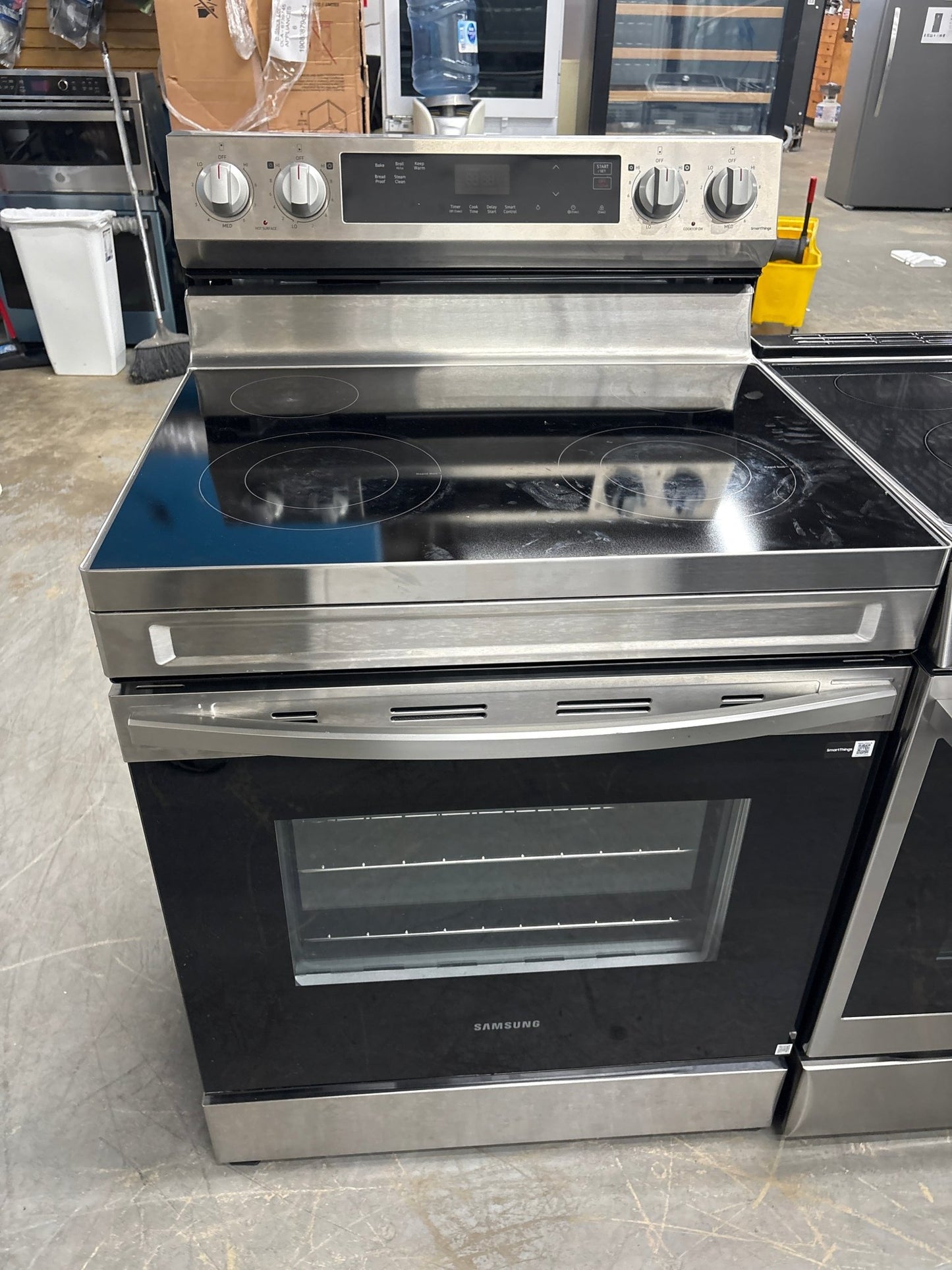Samsung NE63A6111SS NEW 30" Freestanding Electric Smart Range — 4 Burners, 6.3 Cu. Ft. Oven, Stainless Steel